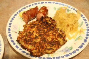 potato pancakes with sauerkraut kielbasa